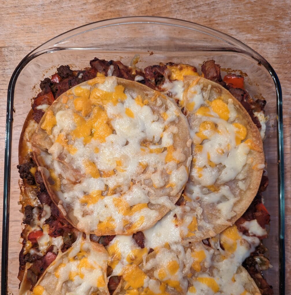 Finished mexican lasagna in the casserole dish